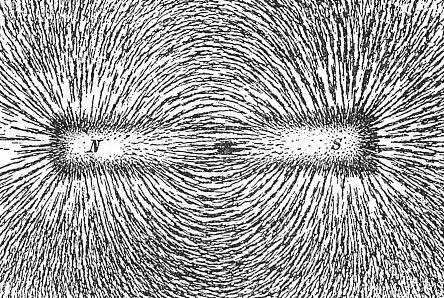 Limalha de ferro são usados ​​nesta imagem para mostrar o caminho de linhas de campo magnético criado por um magnete.