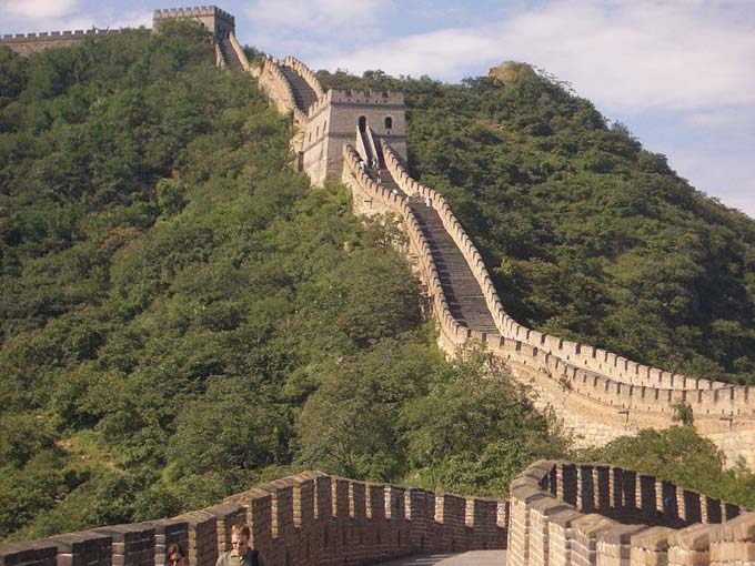 This photo shows a section of the Great Wall of China at Mutianyu. The Great Wall of China is an amazing man made structure that stretches for nearly 9000 kilometres (5500 miles).