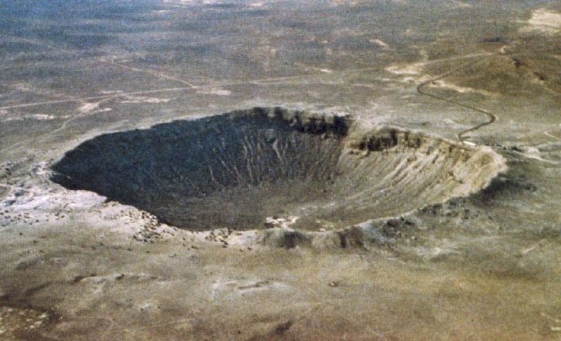 A grainy photo of a huge meteor impact crater in Arizona, United States of America.