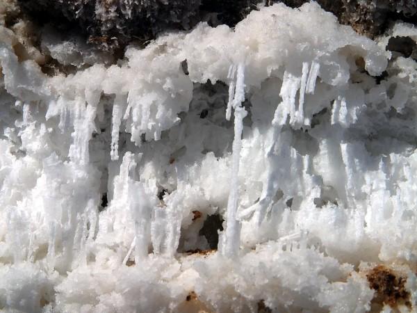 This photo shows an impressive build up of salt particles in a small section of a larger salt flats area.