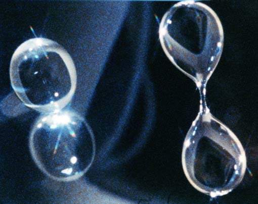 This close up photo shows water droplets in microgravity.