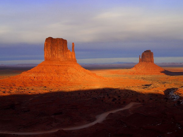 A beautiful photo looking out over Monument Valley, a region near the border of Utah and Arizona famous for its strangely shaped hills (called buttes).