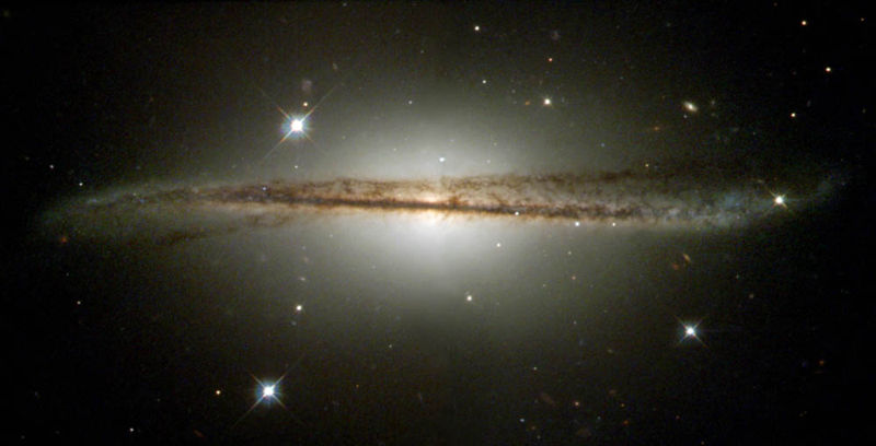 A unique photo taken by the Hubble Space Telescope of a warped galaxy.
