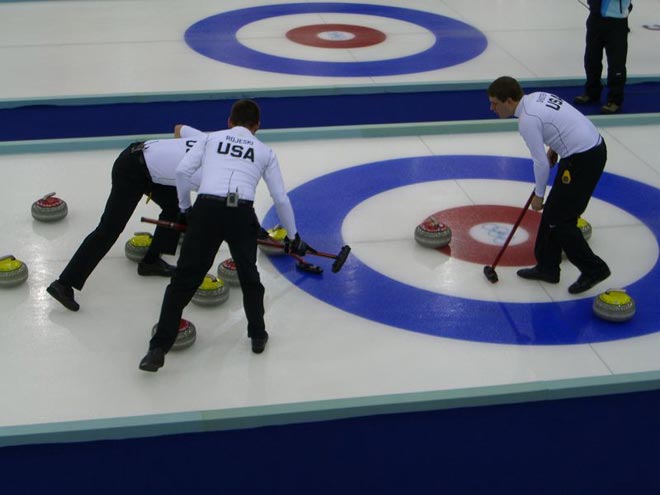 A curling team from the USA competing in the Winter Olympics.